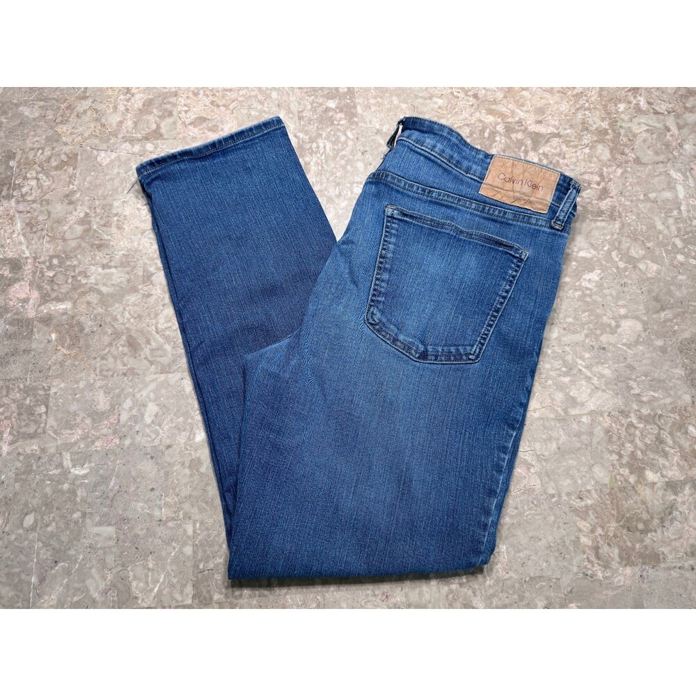 Calvin Klein Men's Slim Fit Medium Wash Stretch Denim Jeans , Actual Size 36x27